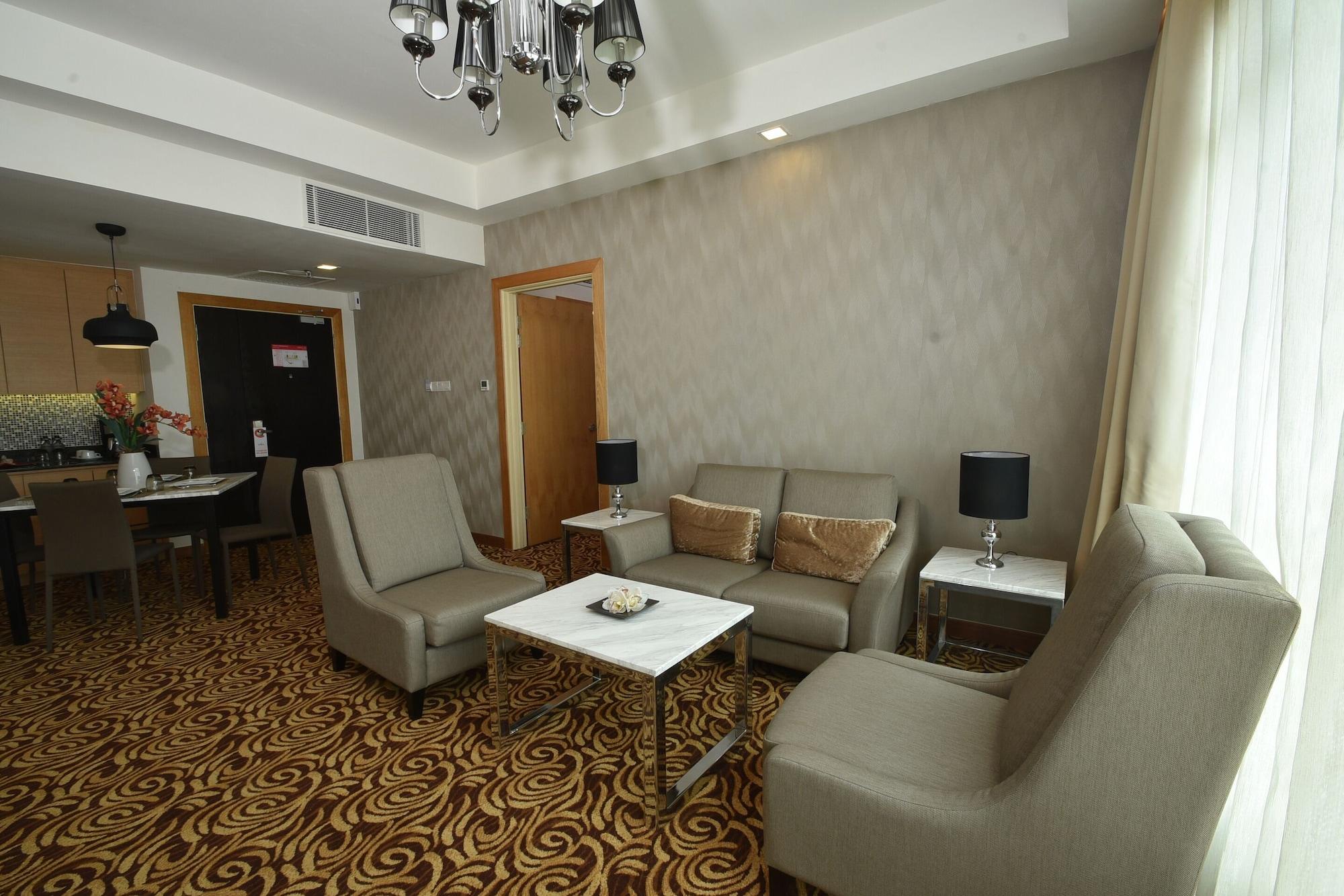 Tenera Hotel Bangi Exteriör bild A living room in a suite at the hotel